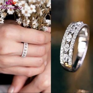 Sterling Silver and White Zircon Ring.